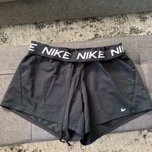 Two Pair of Nike black shorts